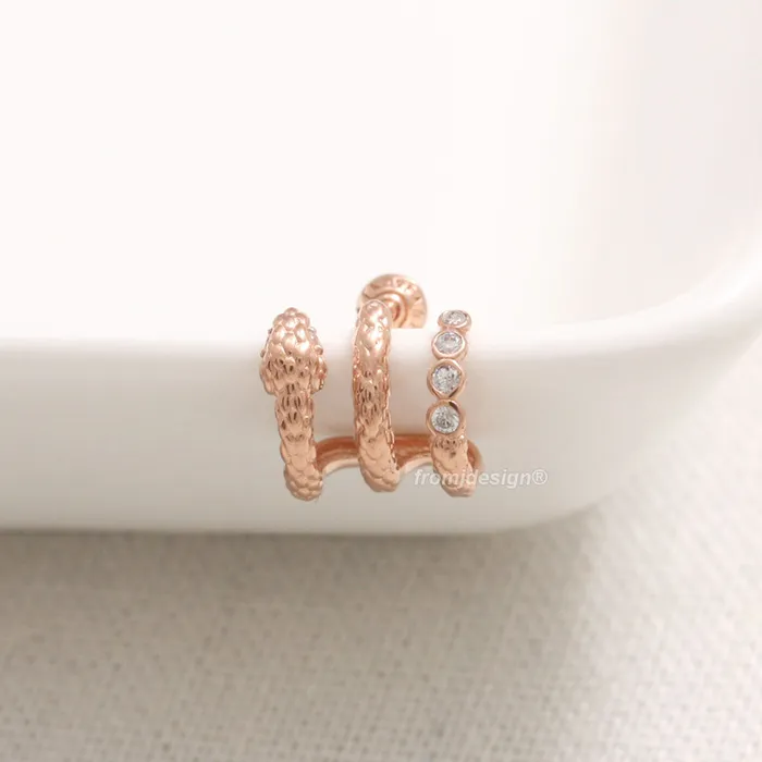 Earrings from J Shop Genuine Diamond Snake Hoop Ear Piercing